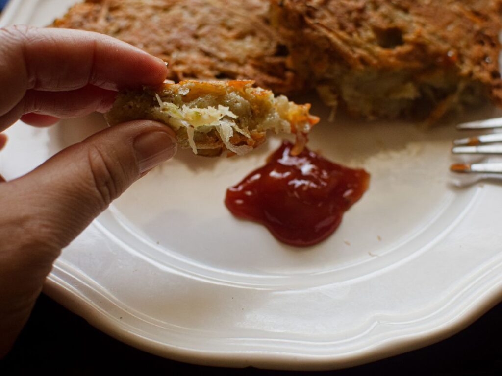 woman holding perfect hashbrown potatoes