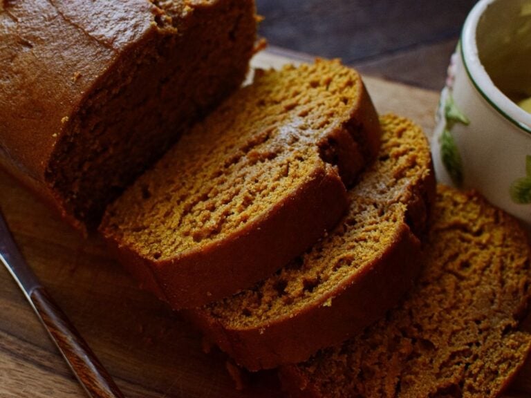 slices of sourdough pumpkin bread on a cutting board